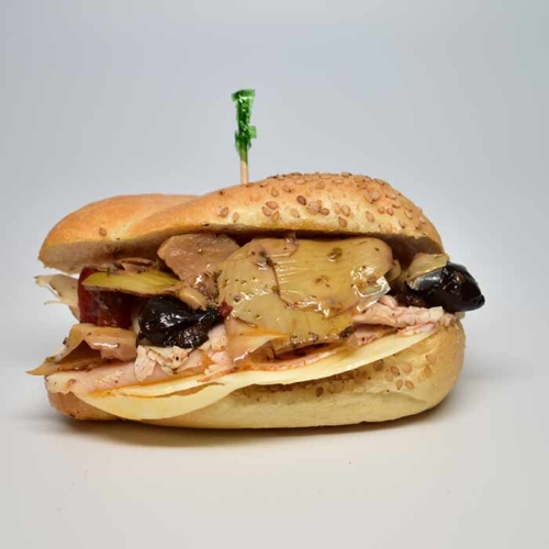 A cartoon owl holding a cell phone.