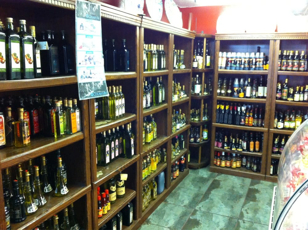 A cartoon owl holding a cell phone.